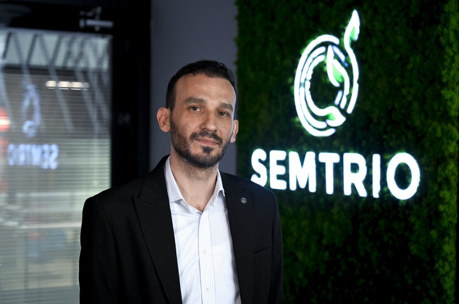 Furkan Sadıkoğlu, an electrical and electronics engineer and director of Semtrio Sustainability, develops transportation-related carbon emissions software, Türkiye, Oct. 9, 2023. (AA Photo)