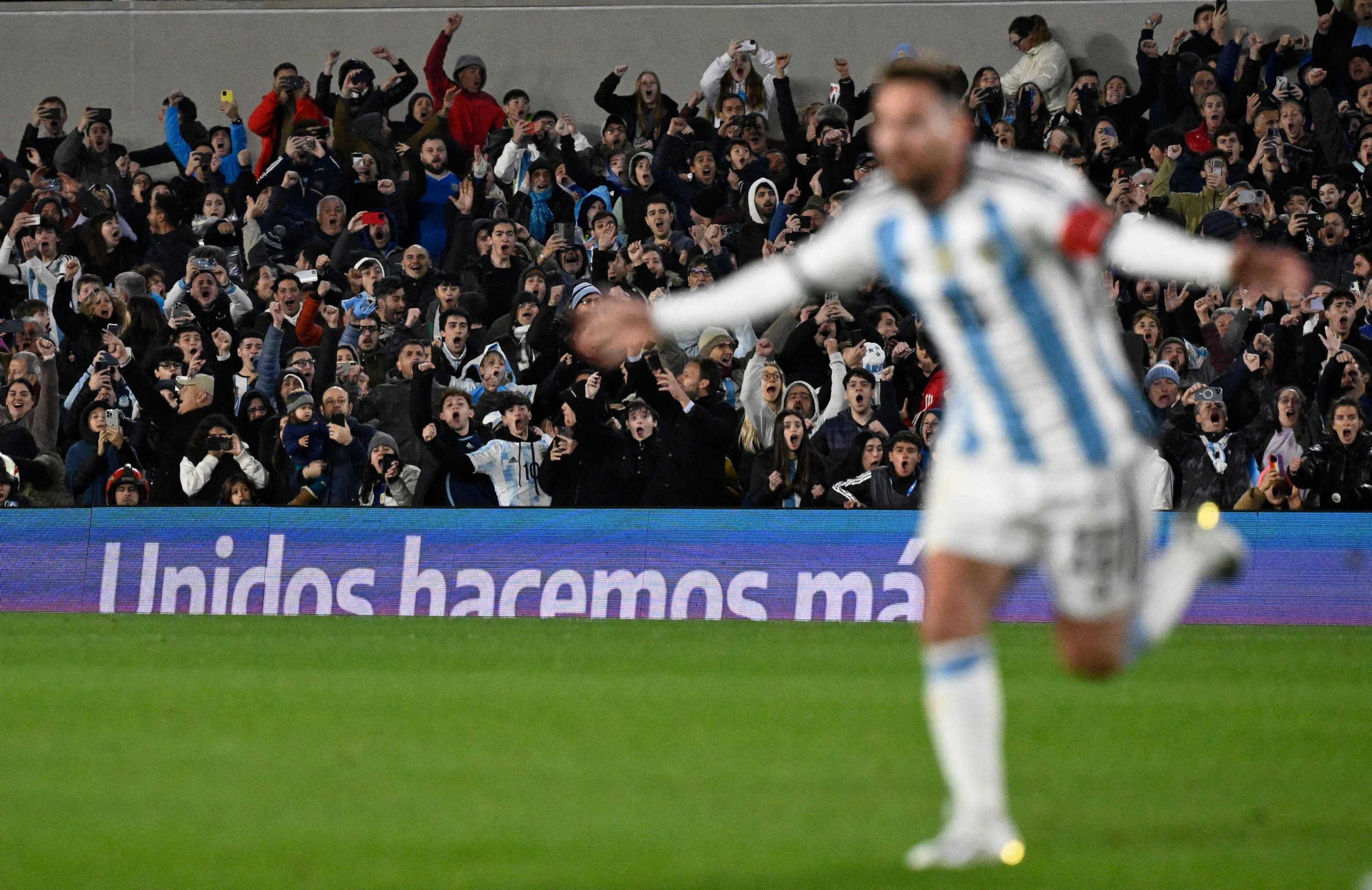 Fans of Argentina celebrate a goal scored by Argentina's forward Lionel Messi (R) during the 2026 FIFA World Cup South American qualifiers football match between Argentina and Ecuador, Buenos Aires, Argentina, Sept. 7, 2023. (AFP Photo)