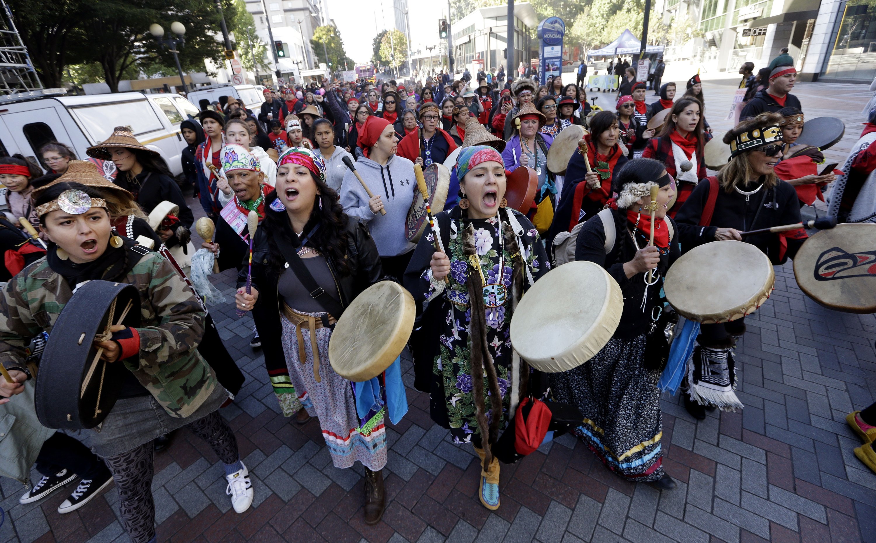 The archive photo show women drummers sing as they lead a march during an Indigenous Peoples Day event, Seattle, U.S., Oct. 9, 2017. (AP Photo)