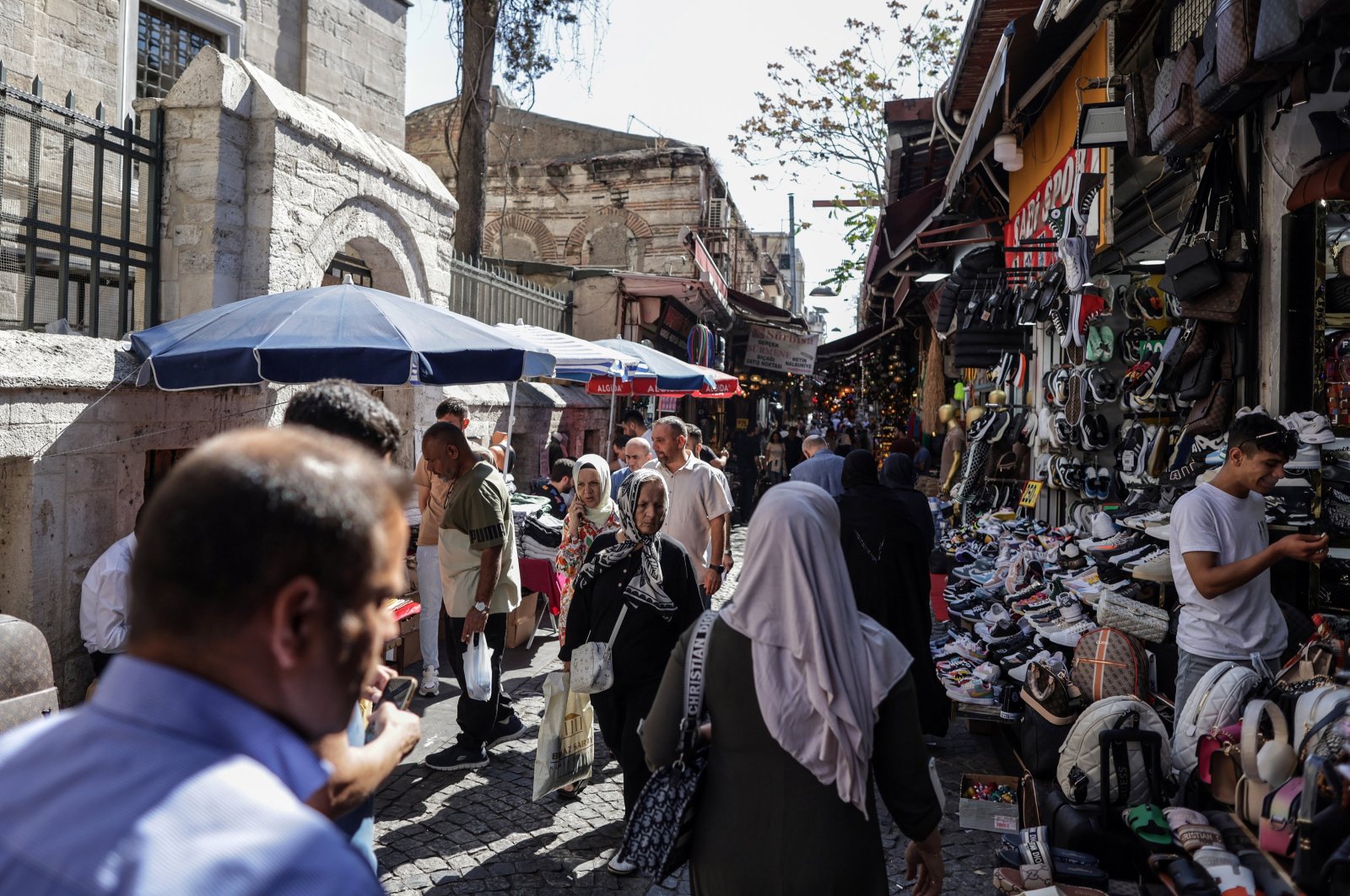 People walk at the Tahtakale Bazaar in Istanbul, Türkiye, Sept. 19, 2023. (EPA Photo)