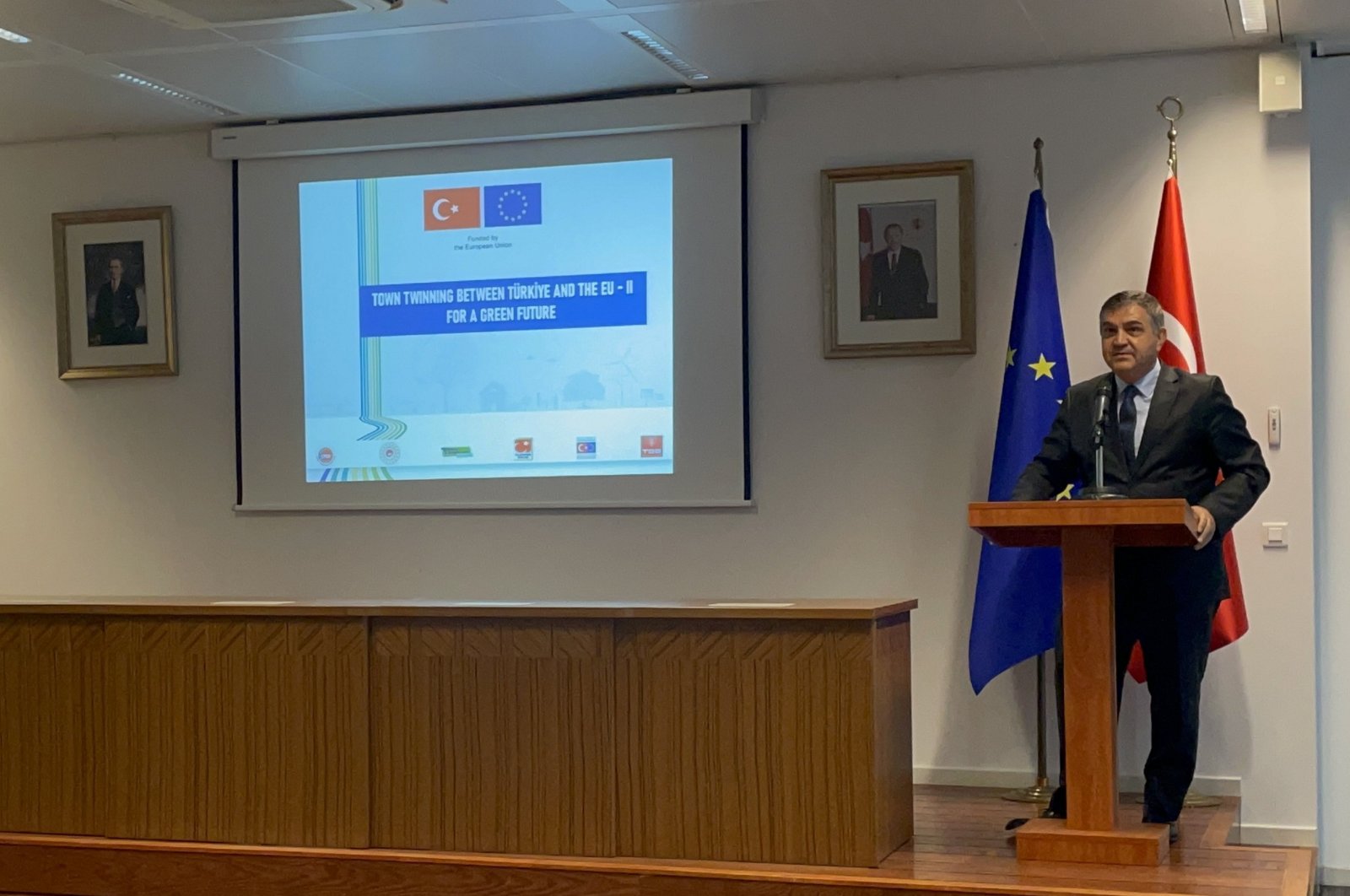Türkiye&#039;s permanent representative to the EU, Ambassador Faruk Kaymakcı, delivers a speech during a ceremony announcing the launch of climate projects between the cities from European Union countries and Türkiye, Brussels, Belgium, Oct. 9, 2023. (AA Photo)