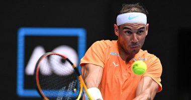 Spain&#039;s Rafael Nadal hits a return against Britain&#039;s Jack Draper during their men&#039;s singles match on day one of the Australian Open tennis tournament, Melbourne, Australia, Jan. 16, 2023. (AFP Photo)