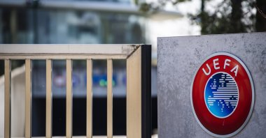 The UEFA logo is displayed near the entrance of the UEFA headquarters, Nyon, Switzerland, March 17, 2020. (AP Photo)