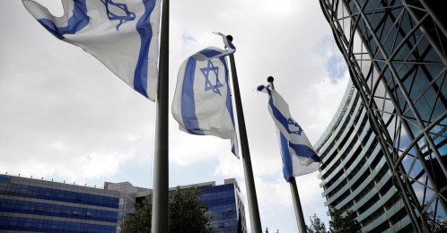 Israeli national flags flutter near office towers at a business park also housing high-tech companies, at Ofer Park in Petah Tikva, Israel, Aug. 27, 2020. (Reuters Photo)