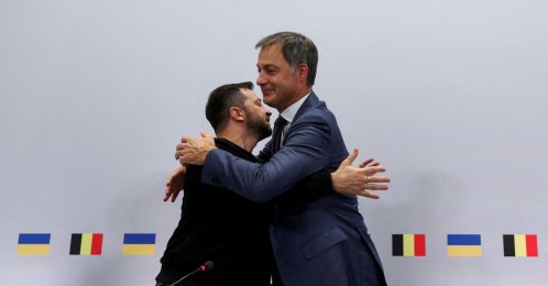 Ukraine's President Volodymyr Zelenskyy and Belgium's PM Alexander De Croo hug at the end of a press conference, in Brussels, Belgium, Oct. 11, 2023. (Reuters Photo)