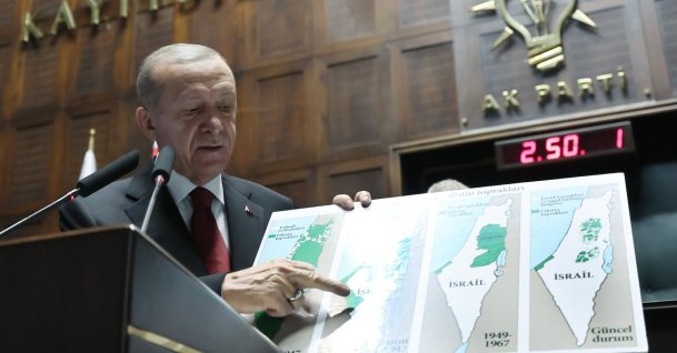 President Recep Tayyip Erdoğan shows a map of Palestinian territories occupied by Israel during his speech at the Justice and Development Party (AK Party) group parliamentary meeting in the capital Ankara, Türkiye, Oct. 11, 2023. (AA Photo)