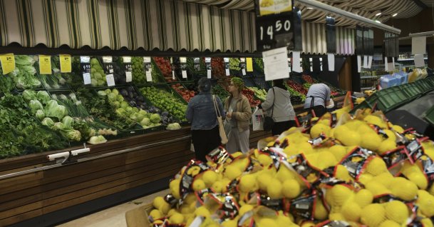 People buy local products at a food market, in Ankara, Türkiye, May 8, 2022. (AP Photo)