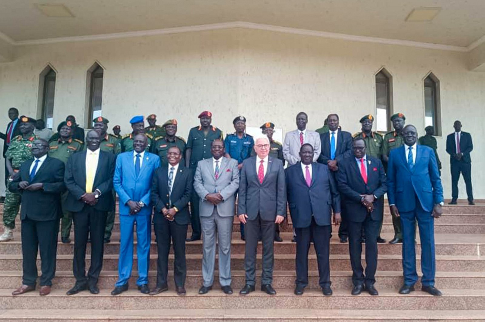 Turkish Ambassador to Juba Erdem Mutaf (C) poses with South Sudan officials at a ceremony for handover of uniforms, in Juba, South Sudan, Oct. 10, 2023. (AA Photo)