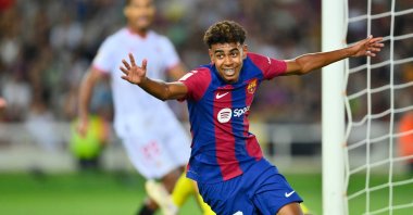 Barcelona's Lamine Yamal celebrates scoring a goal during the La Liga football match against Sevilla FC at the Estadi Olimpic Lluis Companys, Barcelona, Spain, Sept. 29, 2023. (AFP Photo)