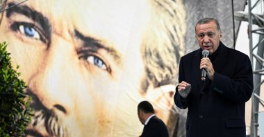 President Recep Tayyip Erdoğan addresses his supporters during a rally, in front of a poster of Mustafa Kemal Atatürk, the founder of modern Türkiye, ahead of the May 14 presidential and parliamentary elections, Istanbul, Türkiye, May 12, 2023. (Reuters Photo)
