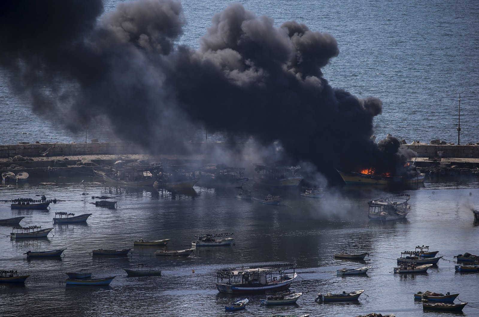 Smoke rises from the Gaza port following an Israeli airstrike, in Gaza City, Oct. 12, 2023. (EPA Photo)