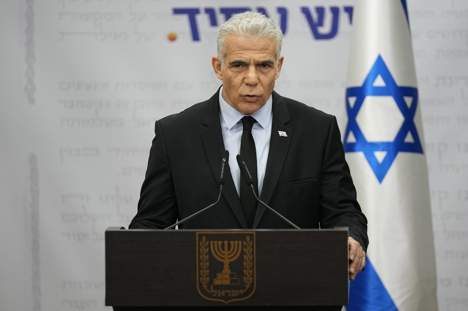 Yair Lapid, leader of the opposition&#039;s Yeah Atid party addresses the media in the Knesset, Monday, March 27, 2023. (AP File Photo)