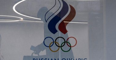 Logo of the Russian Olympic Committee (ROC) on the window of its headquarters, Moscow, Russia, Dec. 17, 2020. (AFP Photo)