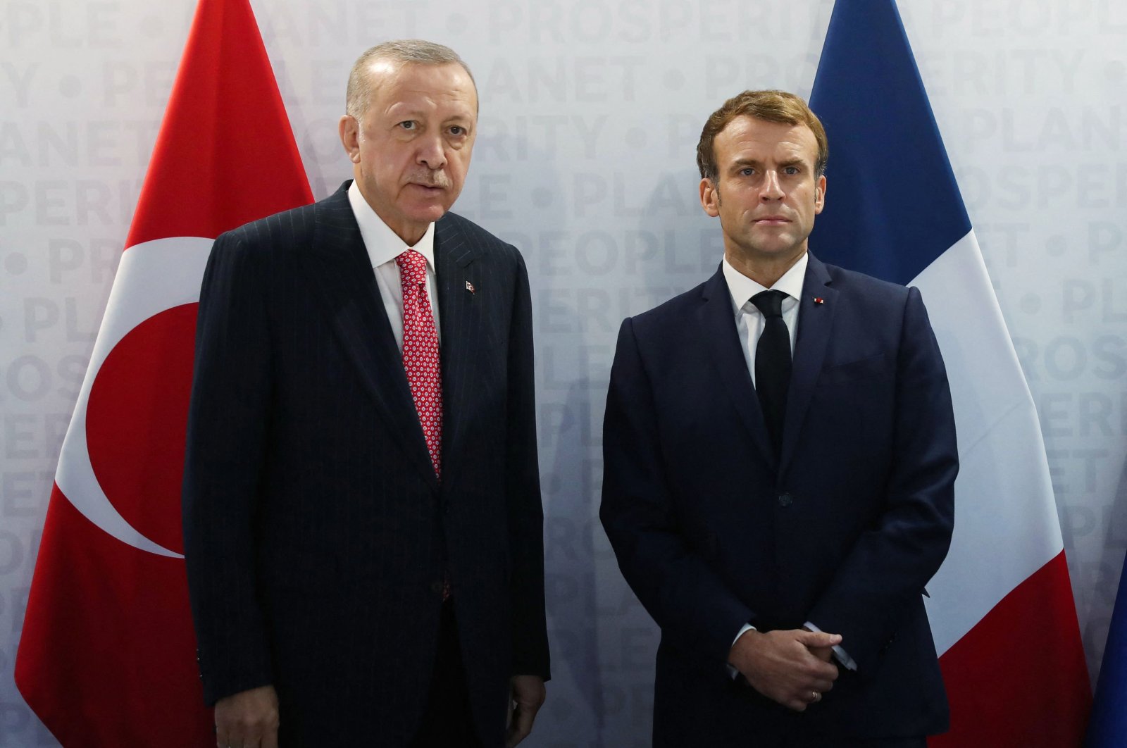 President Recep Tayyip Erdoğan and French President Emmanuel Macron pose before their meeting in Rome, Italy, Oct. 31, 2021. (AFP Photo)