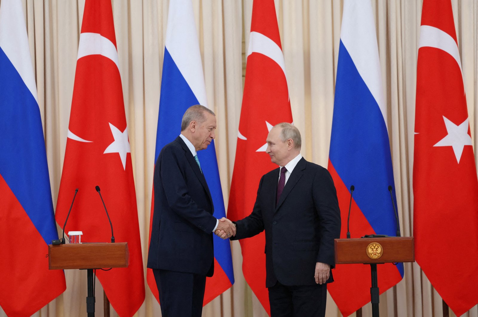President Recep Tayyip Erdoğan shakes hands with his Russian counterpart Vladimir Putin during a press conference in Sochi, Russia Sept. 4, 2023. (Reuters Photo)