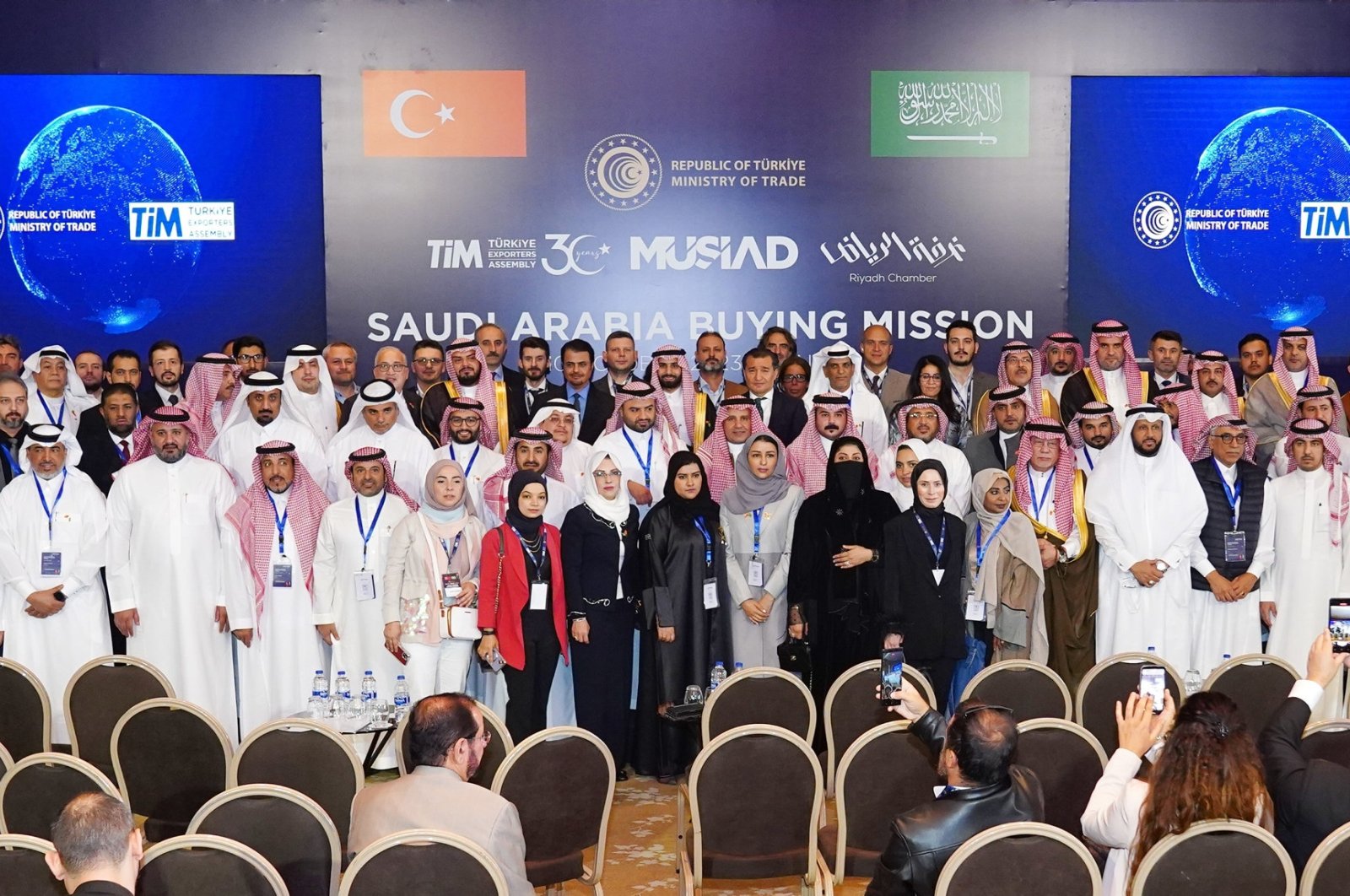 Turkish and Saudi businesspeople pose for a photo during an event in Istanbul, Türkiye, Oct. 10, 2023. (AA Photo)