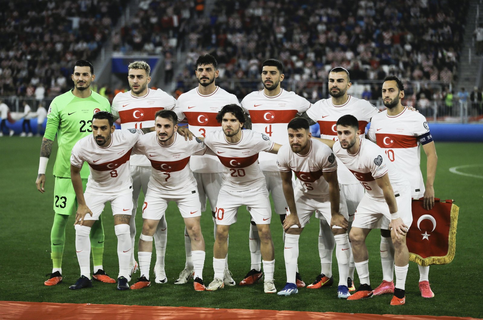 Turkish players celebrate pose for a group photo before the Euro 2024 qualifiers match against Croatia, Osijek, Croatia, Oct. 12, 2023. (AA Photo)