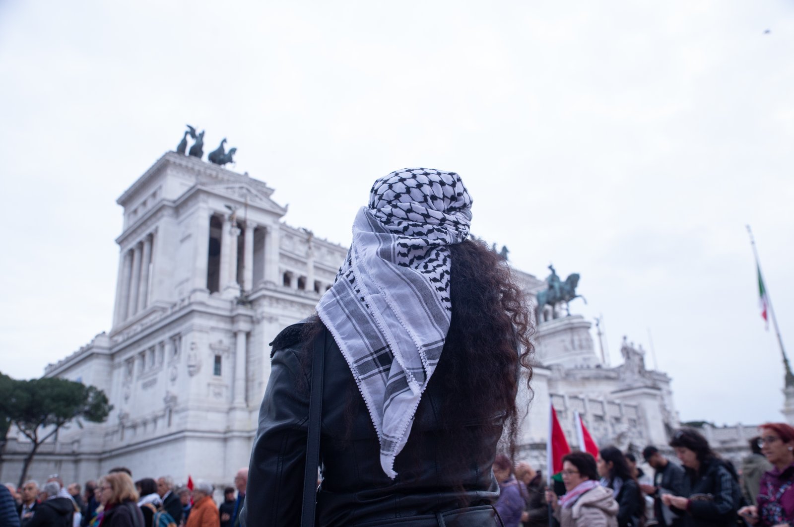 A girl wears a keffiyeh during the sit-in in Rome, Sept. 3, 2023. (Reuters File Photo)