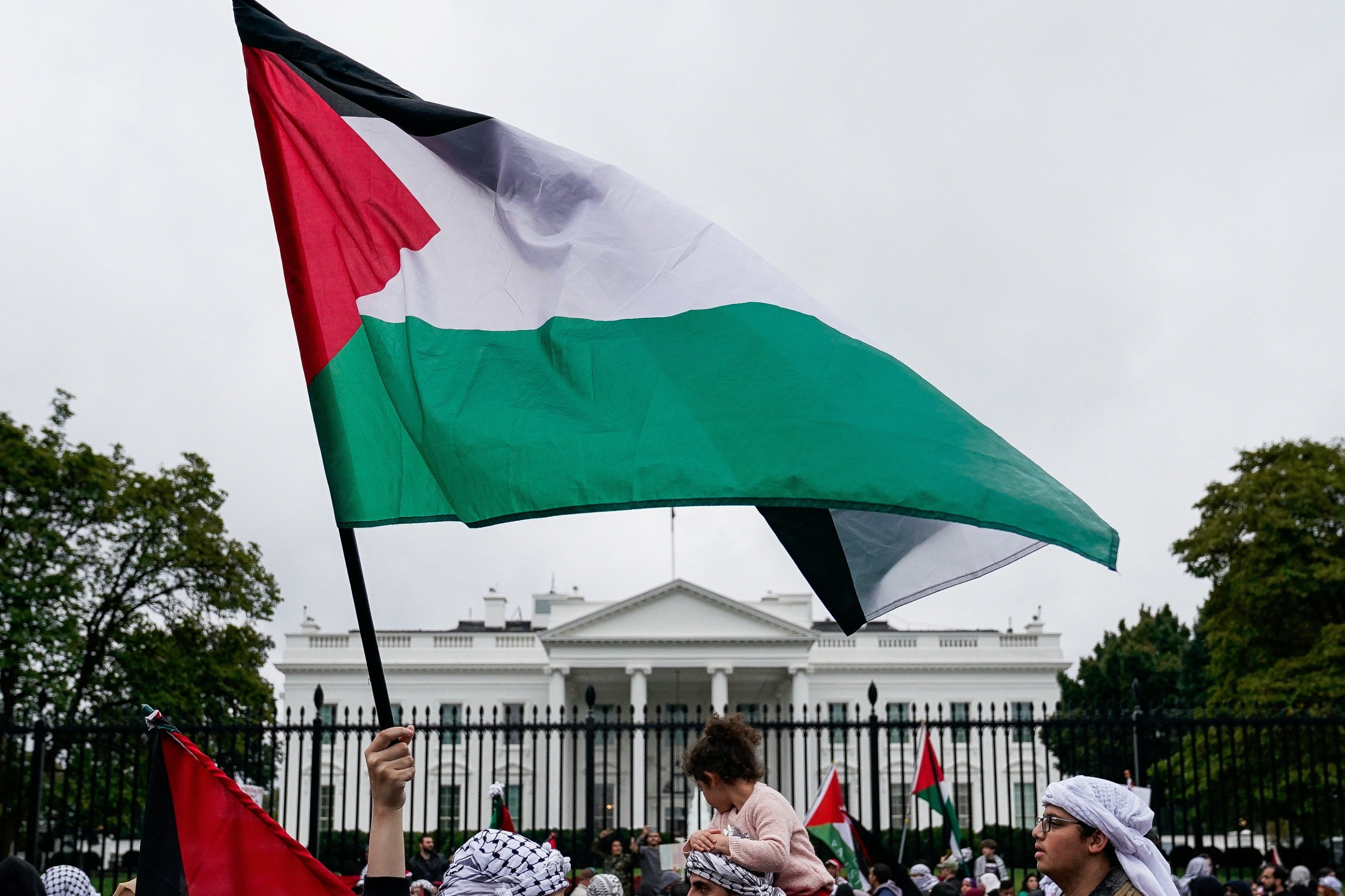 Supporters of the Palestinian people hold a rally and march called a 'Day of Action for Palestine' as the conflict between Israeli and Hamas continues, near the White House in Washington, U.S., October 14, 2023. REUTERS/Elizabeth Frantz