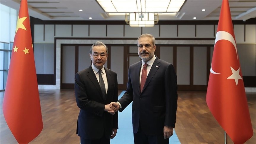 Hakan Fidan shakes hands with Wang Yi in the capital Ankara, Türkiye, July 26, 2023. (AA Photo) 