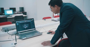 Professor A.F.M. Shahen Shah works in the laboratory of Yıldız Technical University. (Photo by Mohammad Zakir Hossain)