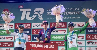 Spain&#039;s Victor Langellotti (C), Kazakhstan&#039;s Alexsey Lutsenko (L) and Giulio Pellizzari stand on the podium after the 58th Presidential Cycling Tour, Istanbul, Türkiye, Oct. 15, 2023. (AA Photo)