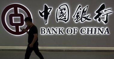 A man walks past the Bank of China logo at its booth at the China International Fair for Trade in Services (CIFTIS) in Beijing, China, Sept. 2, 2023. (Reuters Photo)