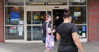 People walk past a Rite Aid store in Brooklyn, New York, U.S., Aug. 28, 2023. (AFP Photo)