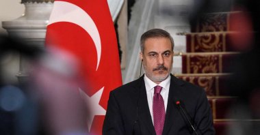 Foreign Minister Hakan Fidan looks on during a joint news conference with the Egyptian foreign minister in Cairo on Oct. 14, 2023. (AFP Photo)