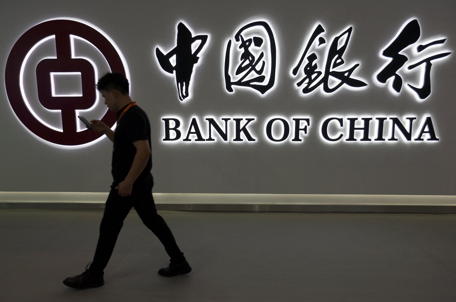 A man walks past the Bank of China logo at its booth at the China International Fair for Trade in Services (CIFTIS) in Beijing, China, Sept. 2, 2023. (Reuters Photo)