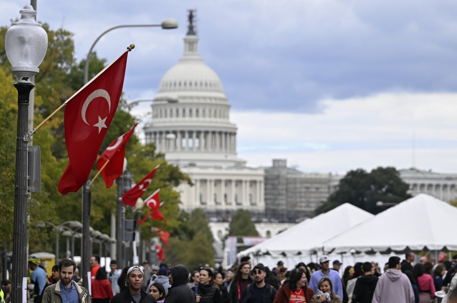 Visitors attend the 2023 edition of the Turkish Festival organized by the American Turkish Association of Washington, D.C. (ATA-DC), at Pennsylvania Avenue NW near the Capitol Building, Washington, U.S., Oct. 15, 2023. (AA Photo)