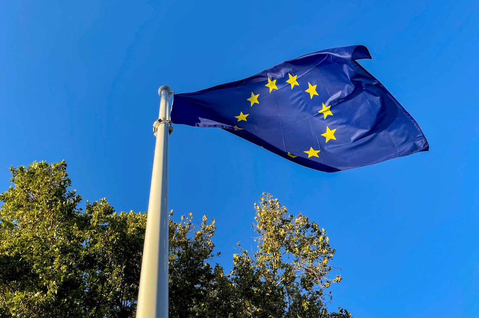 A European Union flag flutters outside the congress palace ahead of the European Political Community summit in Granada, Spain, Oct. 4, 2023. (Reuters Photo)