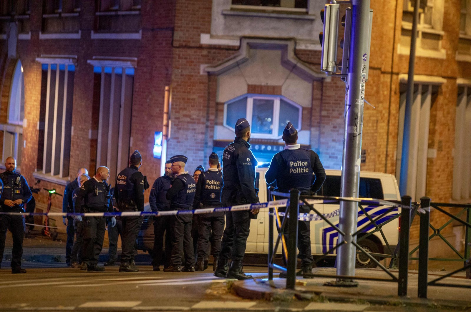 Belgium police stand at the site of a shooting incident in the Ieperlaan - Boulevard d&#039;Ypres, in Brussels, on Oct. 16, 2023. (AFP Photo)