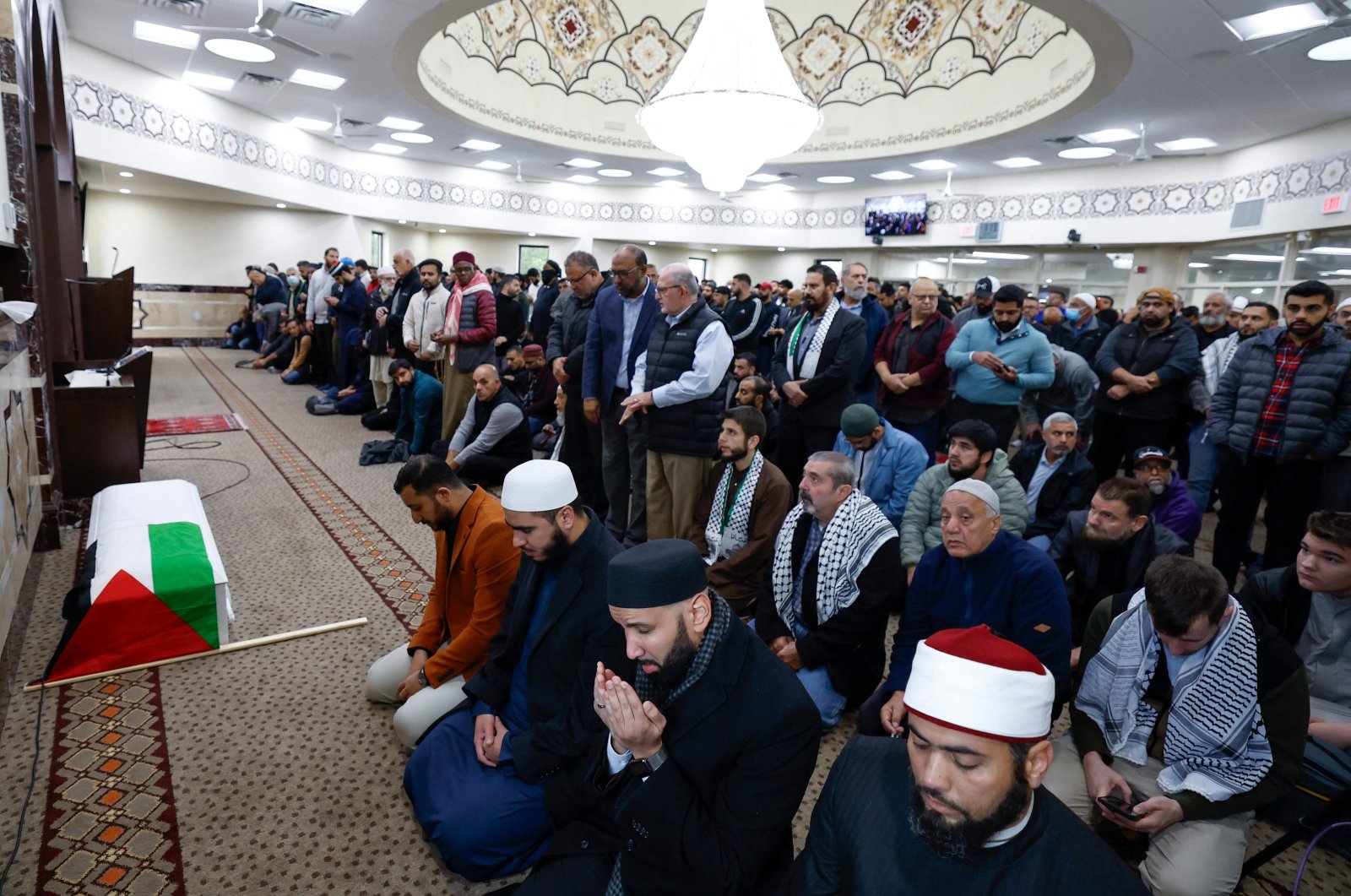 Community members pray during a funeral service for six-year-old Wadea Al-Fayoume at the Mosque Foundation on Oct. 16, 2023. (AFP Photo)