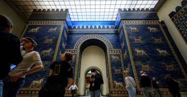 Visitors crowd the Ishtar Gate, constructed circa 575 B.C. by order of King Nebuchadnezzar II, in the south wing of The Pergamon Museum in Berlin, Germany, Oct. 5, 2023. (AFP Photo)  