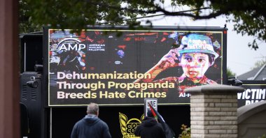The screen shows a picture of the 6-year-old Palestinian boy Wadea al-Fayoume, who died after being stabbed by his homeowner, 71-year-old Joseph M. Czuba, in the Plainfield settlement southwest of Chicago, Illinois, U.S., Oct. 16, 2023. (AA Photo)