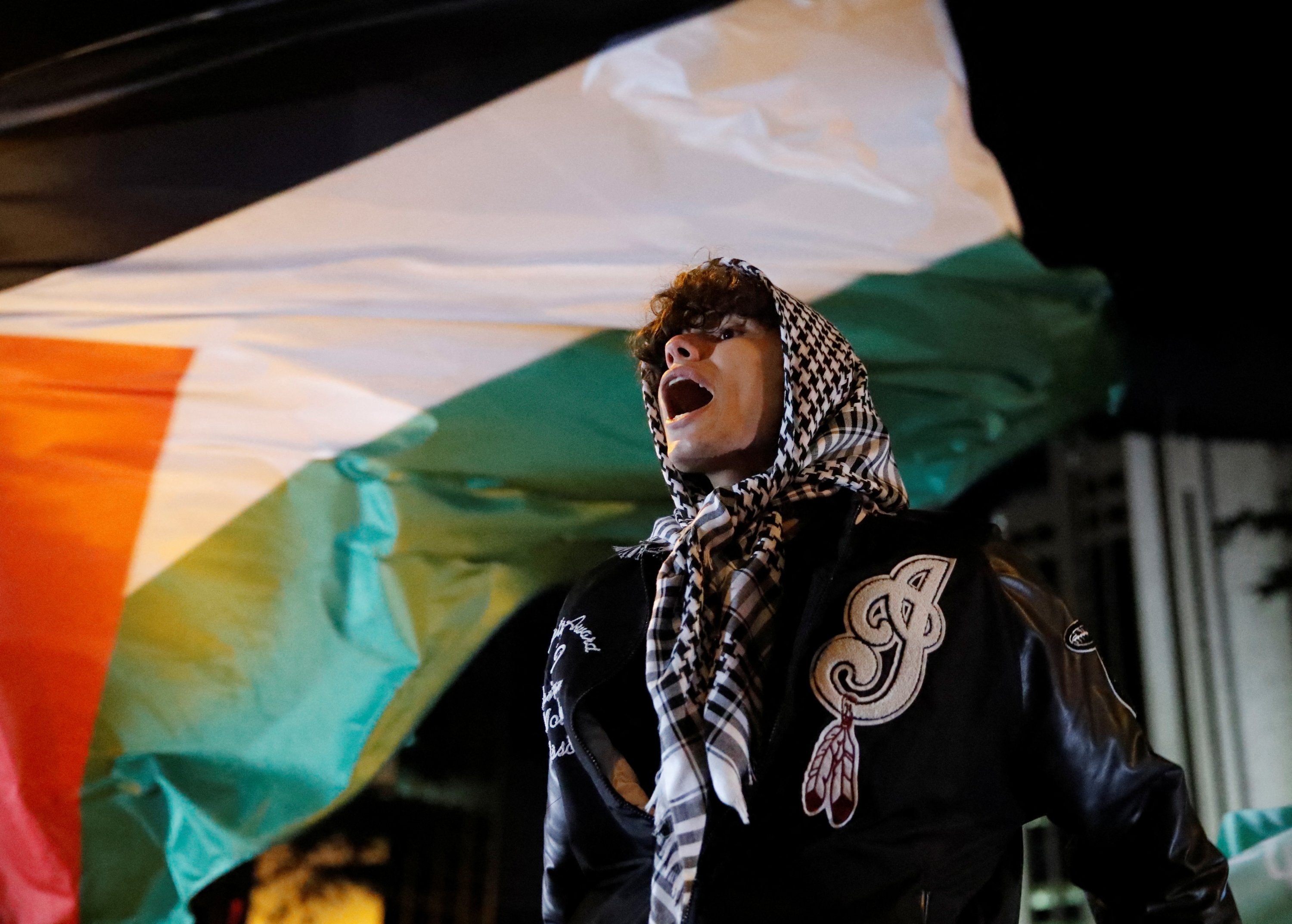 Hidden Man With Palestinian Scarf Over Head Stock Photo