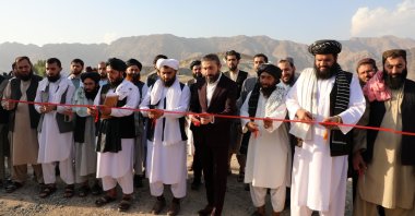 The ribbon-cutting ceremony is performed accompanied by prayers from officials of both Türkiye and Afghanistan, Mihtarlam, Afghanistan, Oct. 19, 2023. (AA Photo)