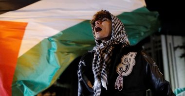 A pro-Palestinian demonstrator shouts slogans during a protest near the Israeli Consulate as the conflict between Israel and Palestine continues, in Istanbul, Türkiye, Oct.18, 2023. (Reuters Photo)