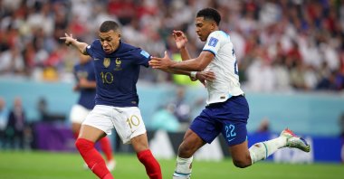 France's Kylian Mbappe (L) vies with England's Jude Bellingham during the FIFA World Cup Qatar 2022 quarterfinal match at Al Bayt Stadium, Al Khor, Qatar, Dec. 10, 2022. (Getty Images Photo)