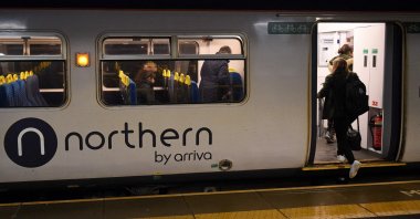 Rail passengers commute on a train, operated by Arriva, a unit of Germany's Deutsche Bahn, in Ashton-under-Lyne, northern U.K., Jan. 29, 2020. (AFP Photo)