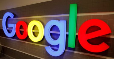 An illuminated Google logo is seen inside an office building in Zurich, Switzerland, Dec. 5, 2018. (Reuters Photo)