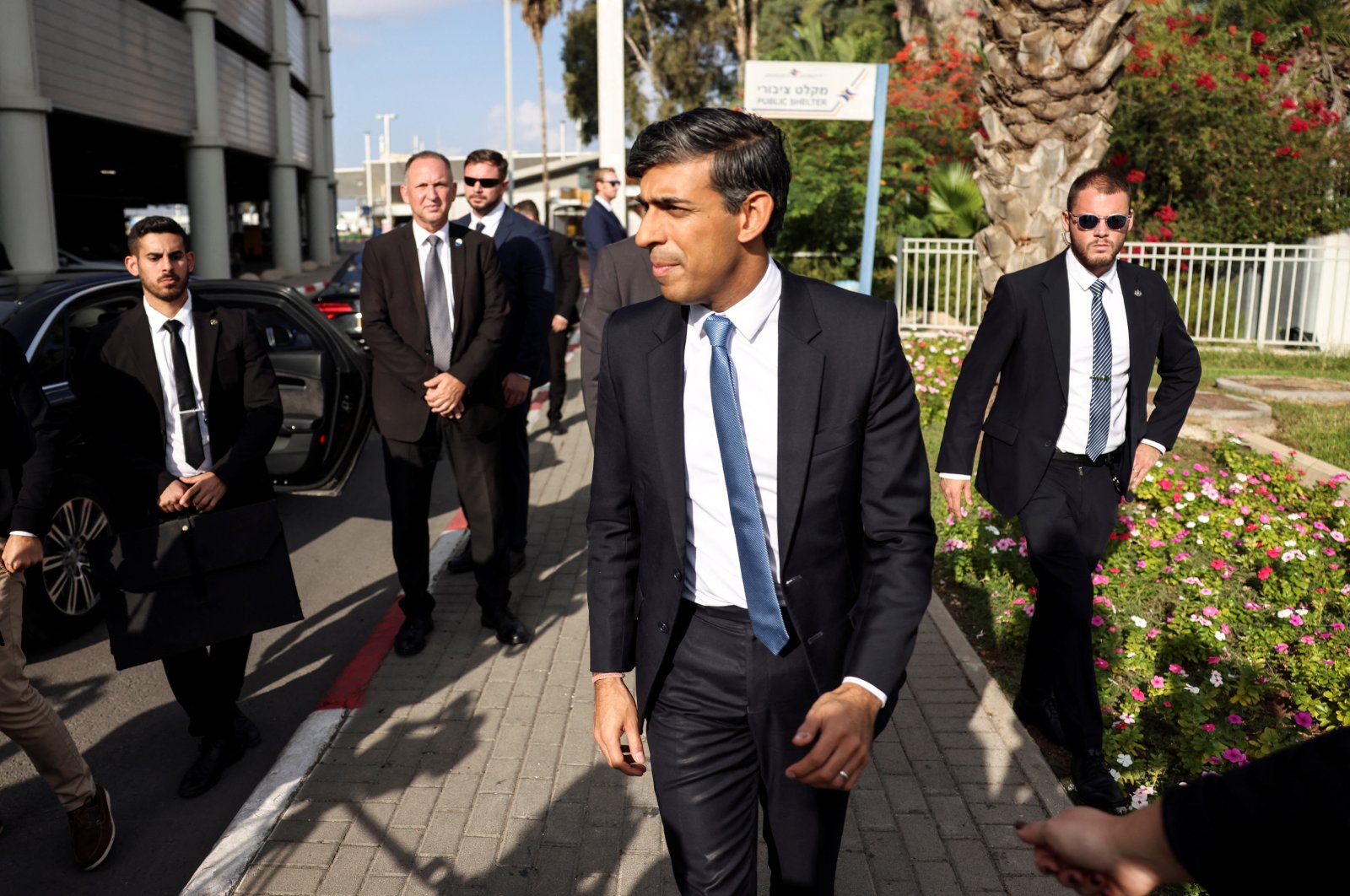 British Prime Minister Rishi Sunak walks after landing at Ben Gurion International Airport Near Tel Aviv, Israel, Oct. 19, 2023. (Reuters Photo)