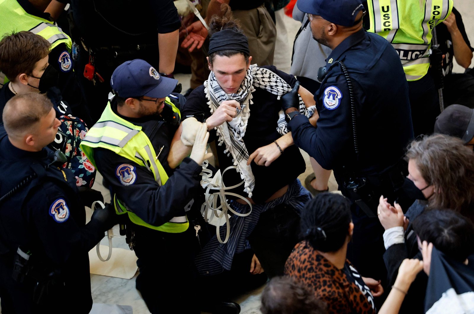 Demonstrators are detained by U.S. Capitol Police in Washington, D.C., U.S., Oct. 18, 2023. (AFP Photo)