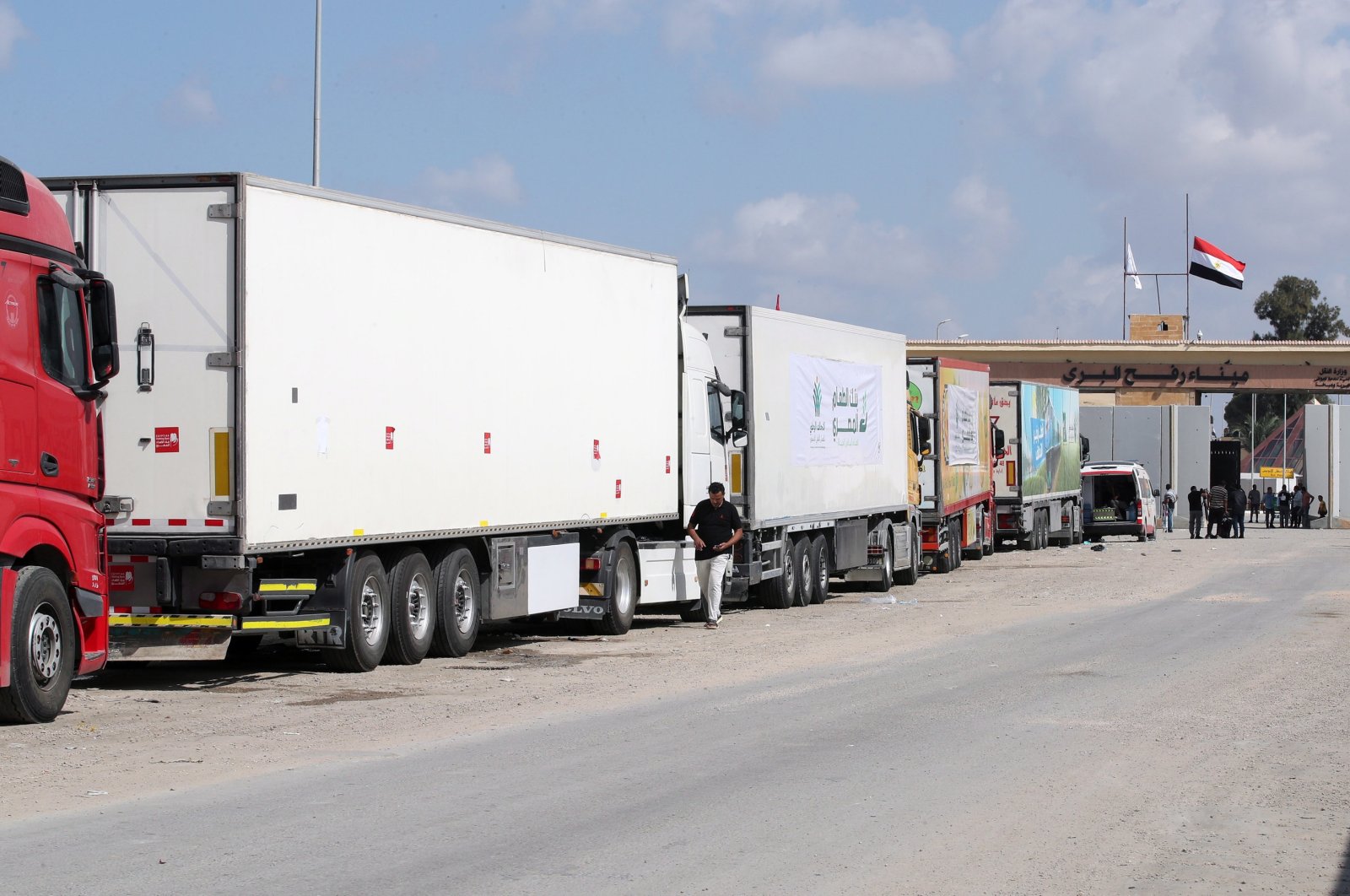 Trucks of a humanitarian aid convoy are parked outside the border gate between Egypt and Gaza, in Rafah, Egypt, Oct. 19 2023. (EPA Photo)