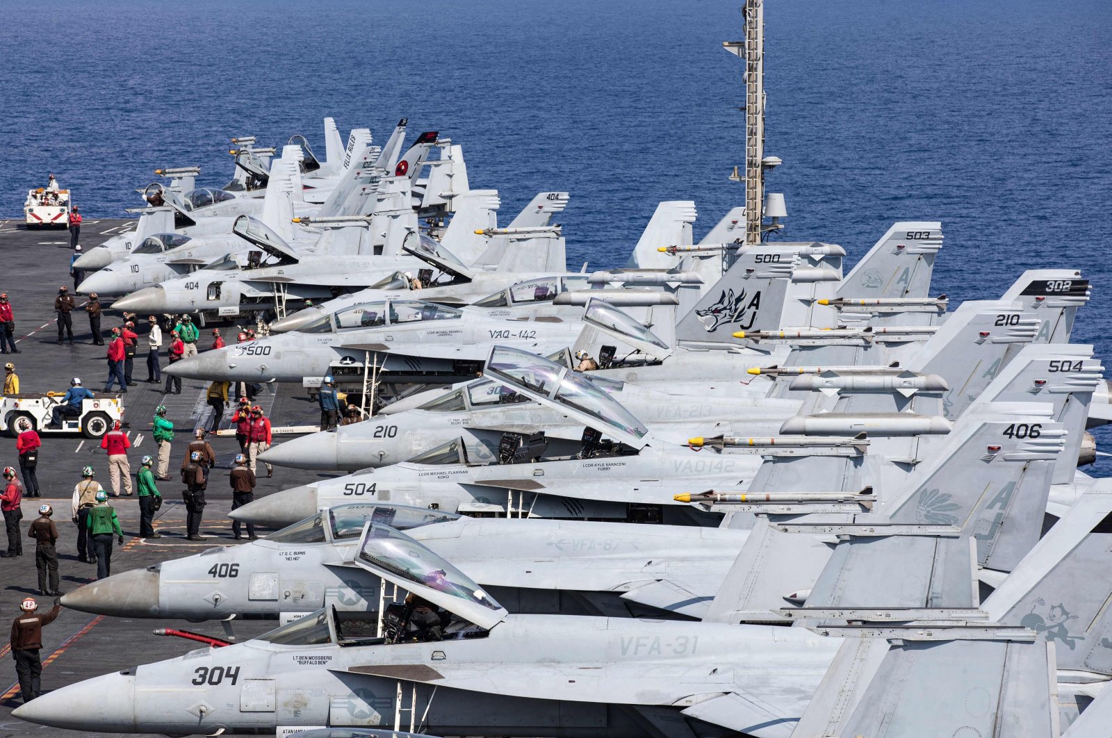 F/A-18 Super Hornets, attached Carrier Air Wing (CVW) 8, prepare for flight operations on the flight deck of the world&#039;s largest aircraft carrier USS Gerald R. Ford (CVN) 78 in the Eastern Mediterranean Sea, Oct. 13, 2023. (AFP Photo)