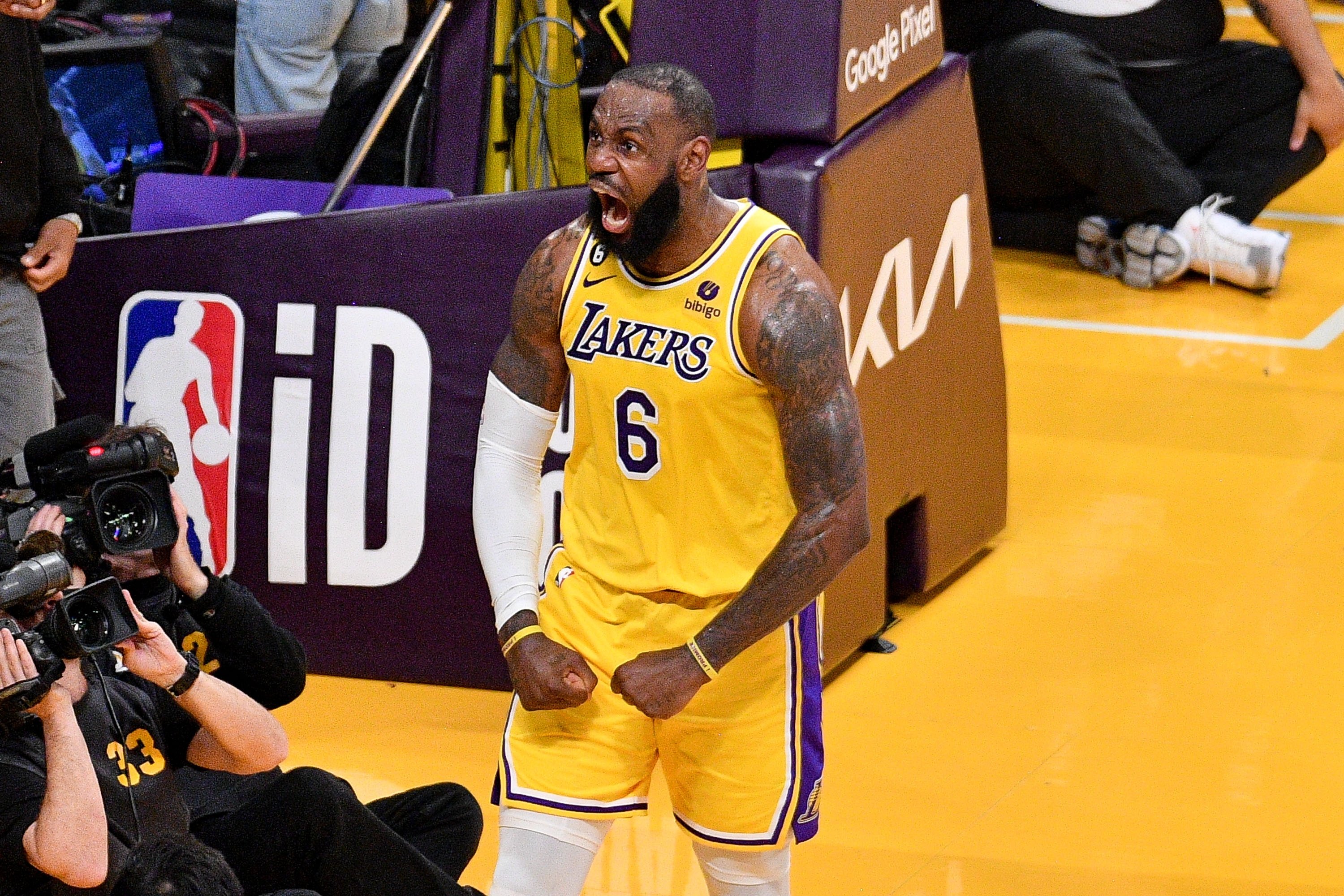 Lakers' LeBron James slam-dunks father time in his 21st NBA season