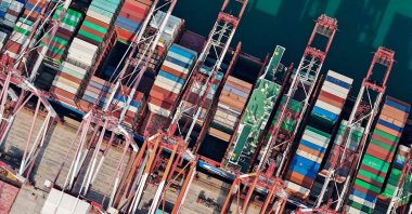 This aerial photo shows cranes and shipping containers at Qingdao port in China&#039;s eastern Shandong province, Oct. 13, 2023. (AFP Photo)