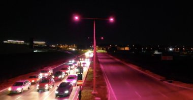 Street lights are illuminated in pink to raise awareness about early breast cancer detection, Bursa, Türkiye, Oct. 20, 2023. (IHA Photo)
