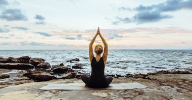 Annually, the Bodrum Yoga and Healthy Living Festival attracts a multitude of global holistic experts who impart their knowledge and techniques to both beginners and experienced participants. (Getty Images Photo)